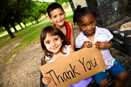 Kids holding a thank you sign